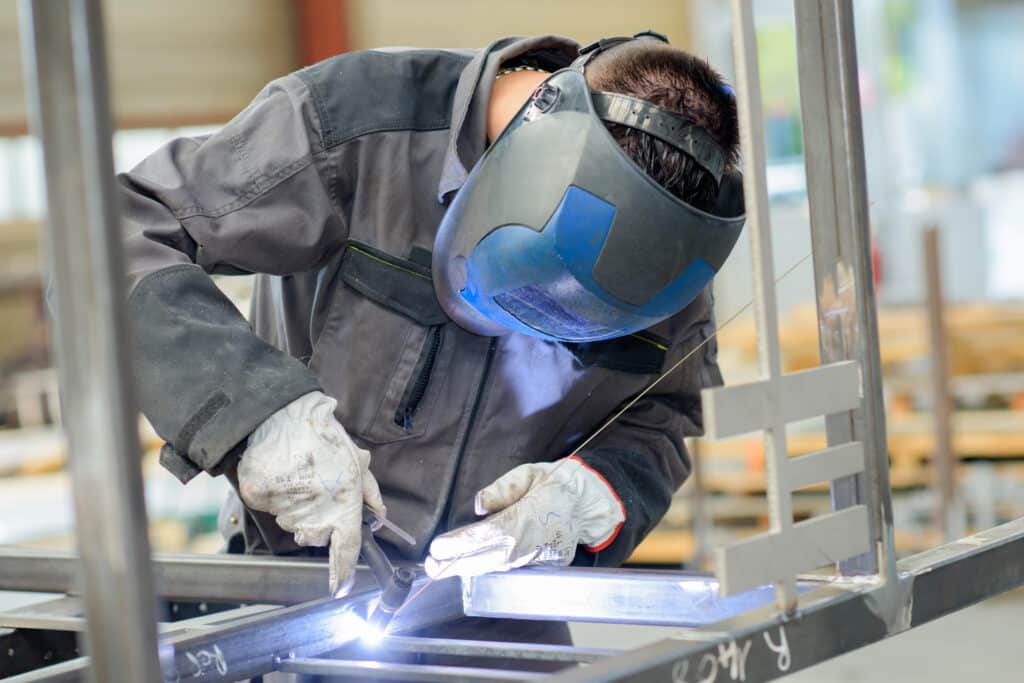 Man welding metal